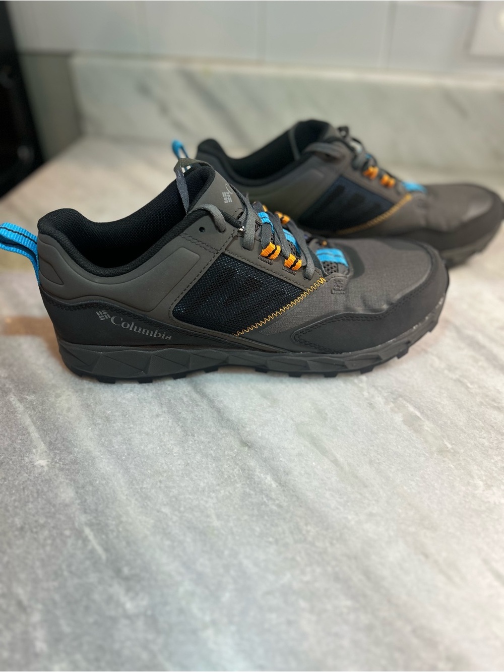 Columbia Men's Black Athletic Trail Shoes with Blue and Orange Accents
